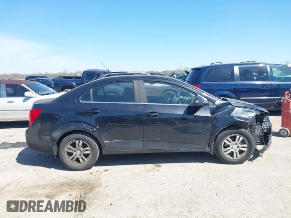 2014 Chevrolet Sonic LT with VIN 1G1JC5SH1E4243143, listed as a IAAI auction lot 41841260 with 170,514 mi miles and . Bid and sale history available at DreamBid. Image 13.