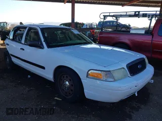 2011 Ford Police Interceptor with VIN 2FABP7BV4BX108119, listed as a IAAI auction lot 41233776 with 129,037 mi miles. Bid and sale history available at carsss.com. Image 1.