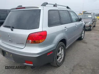 2004 Mitsubishi Outlander LS with VIN JA4LX31F04U038009, listed as a IAAI auction lot 41616254 with 219,527 mi miles. Bid and sale history available at carsss.com. Image 4.