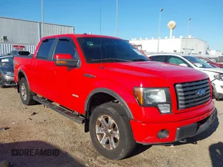 2011 Ford F-150 XLT with VIN 1FTFW1ET5BFC42624, listed as a IAAI auction lot 41853696 with 230,074 mi miles and . Bid and sale history available at DreamBid. Image 1.