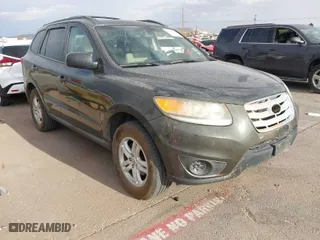 2012 Hyundai Santa Fe GLS with VIN 5XYZG3AB2CG128873, listed as a IAAI auction lot 41874808 with 182,453 mi miles. Bid and sale history available at carsss.com. Image 1.