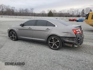 2014 Ford Taurus SEL with VIN 1FAHP2E83EG133168, listed as a Copart auction lot 48346505 with 116,141 mi miles and Salvage Title. Bid and sale history available at carsss.com. Image 2.
