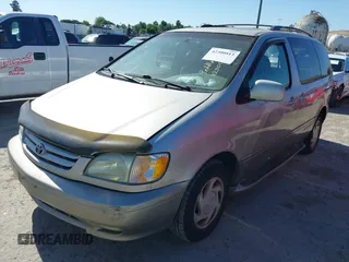 2002 Toyota Sienna LE z VIN 4T3ZF13C12U432578, wystawiony jako IAAI lot #42300813 z przebiegiem 213 088 mil mil oraz . Historia ofert i sprzedaży dostępna na DreamBid. Obrazek 2.