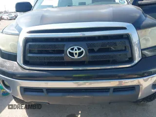 2013 Toyota Tundra 4WD Truck with VIN 5TFDW5F16DX286995, listed as a IAAI auction lot 41584571 with 118,651 mi miles. Bid and sale history available at carsss.com. Image 6.