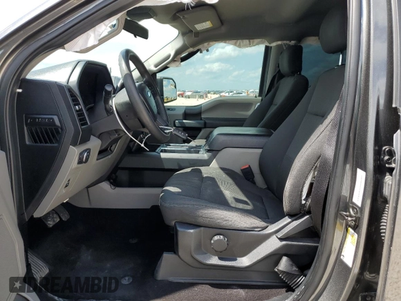 2019 Ford F-150 XL with VIN 1FTEW1CP3KKD25879, listed as a Copart auction lot 54385755 with 146,248 mi miles and Salvage title. Bid and sale history available at DreamBid. Image 7.