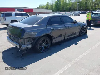 2022 Chrysler 300 S with VIN 2C3CCABG1NH259933, listed as a IAAI auction lot 42056429 with 51,327 mi miles and . Bid and sale history available at DreamBid. Image 4.