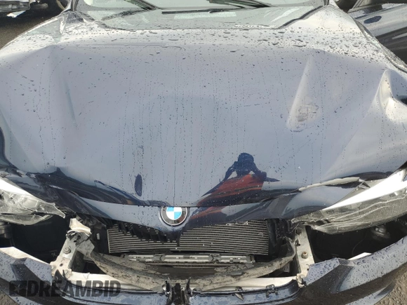 2015 BMW 3 Series 328i xDrive with VIN WBA3B5C59FF963090, listed as a Copart auction lot 62579735 with 53,400 mi miles and Salvage title. Bid and sale history available at DreamBid. Image 11.