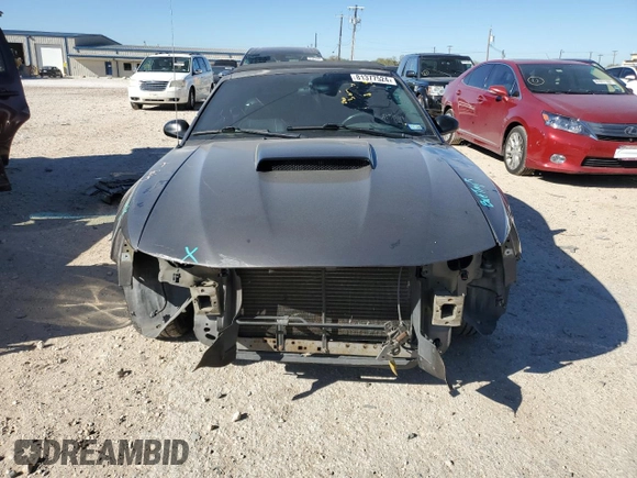 2004 Ford Mustang Deluxe with VIN 1FAFP44404F117628, listed as a Copart auction lot 81377524 with 39,697 mi miles and Salvage Title. Bid and sale history available at carsss.com. Image 5.