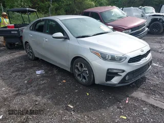 2021 Kia Forte LXS z VIN 3KPF24AD1ME290811, wystawiony jako IAAI lot #42094136 z przebiegiem 69 090 mil mil oraz . Historia ofert i sprzedaży dostępna na DreamBid. Obrazek 1.