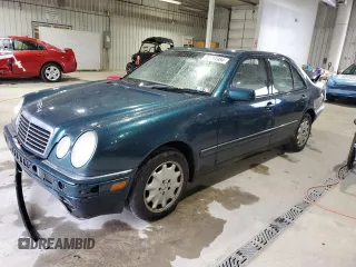 1998 Mercedes-Benz E-Class with VIN WDBJF65F6WA590094, listed as a Copart auction lot 72751984 with 196,048 mi miles and Salvage Title. Bid and sale history available at carsss.com. Image 1.