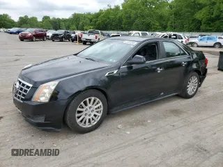 2013 Cadillac CTS Luxury with VIN 1G6DE5E56D0103663, listed as a Copart auction lot 59222205 with 101,297 mi miles and Salvage title. Bid and sale history available at DreamBid. Image 1.