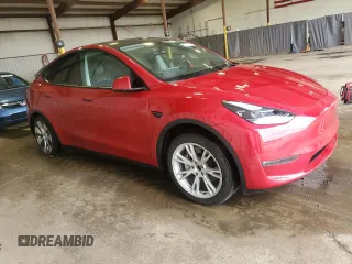 2023 Tesla Model Y Long Range z VIN 7SAYGAEE8PF701618, wystawiony jako Copart lot #57573875 z przebiegiem 39 463 mil mil oraz Szkoda całkowita • Salvage title. Historia ofert i sprzedaży dostępna na DreamBid. Obrazek 4.