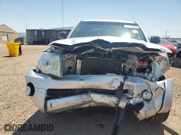 2006 Toyota Tacoma with VIN 5TELU42N76Z283409, listed as a Copart auction lot 61391785 with 77,799 mi miles and Salvage title. Bid and sale history available at DreamBid. Image 5.