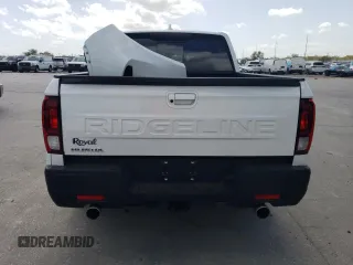 2025 Honda Ridgeline RTL z VIN 5FPYK3F53SB012947, wystawiony jako Copart lot #50899455 z przebiegiem Nie podano mil oraz Szkoda całkowita • Salvage title. Historia ofert i sprzedaży dostępna na DreamBid. Obrazek 12.