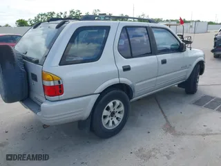1998 Honda Passport LX with VIN 4S6CM58WXW4414530, listed as a IAAI auction lot 42060405 with 175,406 mi miles. Bid and sale history available at carsss.com. Image 4.