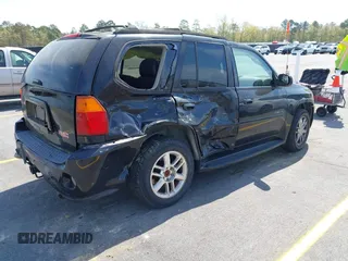 2007 GMC Envoy Denali with VIN 1GKES63MX72103849, listed as a IAAI auction lot 41904190 with 237,261 mi miles. Bid and sale history available at carsss.com. Image 4.