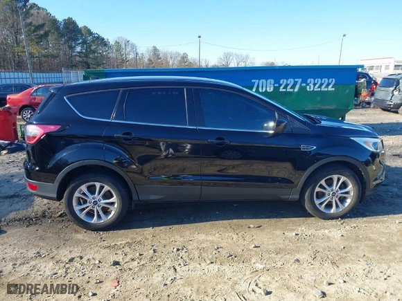 2017 Ford Escape SE with VIN 1FMCU0GD7HUC59045, listed as a IAAI auction lot 41304143 with 125,809 mi miles. Bid and sale history available at carsss.com. Image 13.