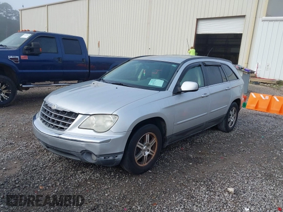 2007 Chrysler Pacifica Touring z VIN 2A8GM68X07R141070, wystawiony jako IAAI lot #41871934 z przebiegiem 299 553 mil mil oraz . Historia ofert i sprzedaży dostępna na DreamBid. Obrazek 2.