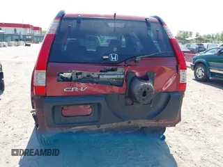 2006 Honda CR-V LX with VIN JHLRD68556C001167, listed as a IAAI auction lot 42104036 with 113,590 mi miles and . Bid and sale history available at DreamBid. Image 6.