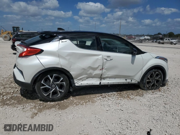 2019 Toyota C-HR XLE with VIN NMTKHMBX4KR100572, listed as a Copart auction lot 54371845 with 42,917 mi miles and Salvage Title. Bid and sale history available at DreamBid. Image 3.