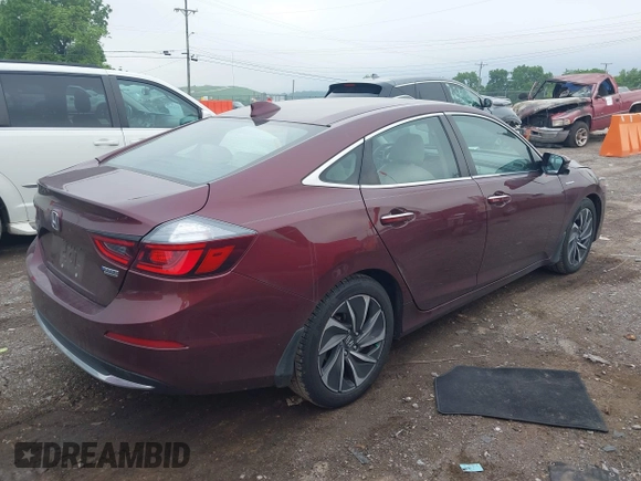 2020 Honda Insight Touring z VIN 19XZE4F93LE010040, wystawiony jako IAAI lot #42240572 z przebiegiem 52 299 mil mil oraz . Historia ofert i sprzedaży dostępna na DreamBid. Obrazek 4.
