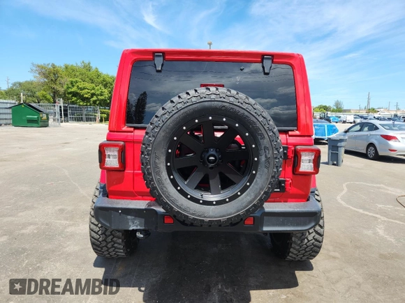 2020 Jeep Wrangler Unlimited Sahara with VIN 1C4HJXEN0LW115812, listed as a Copart auction lot 65534905 with 40,677 mi miles and Clean title. Bid and sale history available at DreamBid. Image 6.