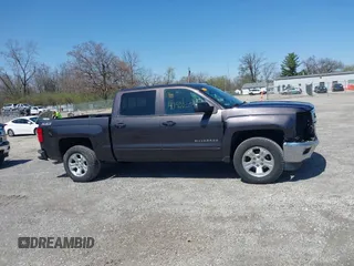 2015 Chevrolet Silverado 1500 LT with VIN 3GCUKREC8FG510992, listed as a IAAI auction lot 41966354 with 176,347 mi miles. Bid and sale history available at carsss.com. Image 14.