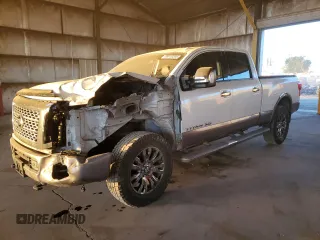 2016 Nissan Titan XD Platinum Reserve with VIN 1N6BA1F42GN512715, listed as a Copart auction lot 88910205 with 85,364 mi miles and Salvage Title. Bid and sale history available at carsss.com. Image 1.