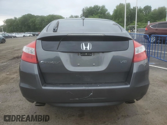 2012 Honda Crosstour EX-L z VIN 5J6TF1H5XCL001140, wystawiony jako Copart lot #58998445 z przebiegiem 244 410 mil mil oraz Szkoda całkowita • Salvage title. Historia ofert i sprzedaży dostępna na DreamBid. Obrazek 6.