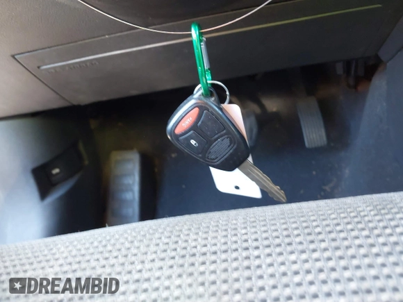 2012 Dodge Caliber SXT with VIN 1C3CDWDA7CD533844, listed as a IAAI auction lot 41391978 with 149,762 mi miles and . Bid and sale history available at DreamBid. Image 11.