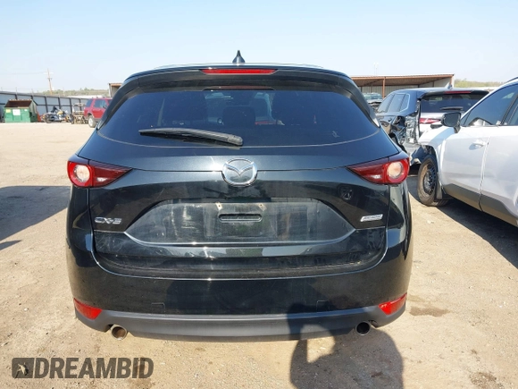 2019 Mazda CX-5 Touring with VIN JM3KFACM6K0533203, listed as a IAAI auction lot 41973125 with 106,882 mi miles and . Bid and sale history available at carsss.com. Image 17.