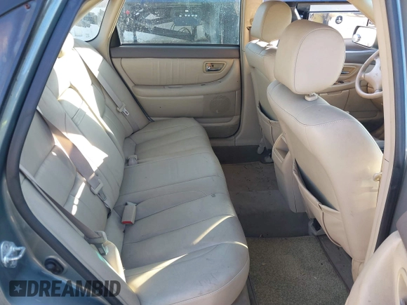 2002 Toyota Avalon XL with VIN 4T1BF28B02U262066, listed as a IAAI auction lot 41896384 with 184,646 mi miles and . Bid and sale history available at DreamBid. Image 8.