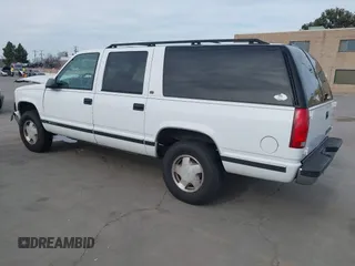 1997 Chevrolet Suburban with VIN 3GNFK16R9VG187426, listed as a IAAI auction lot 41678063 with 131,387 mi miles. Bid and sale history available at carsss.com. Image 3.