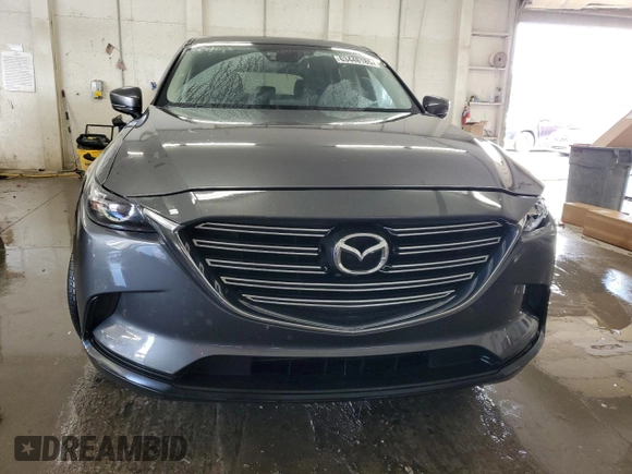2017 Mazda CX-9 Touring with VIN JM3TCBCY5H0134295, listed as a Copart auction lot 63448185 with 174,248 mi miles and Salvage title. Bid and sale history available at DreamBid. Image 5.