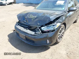 2024 Volkswagen Jetta Sport with VIN 3VWBM7BU6RM011808, listed as a IAAI auction lot 42082762 with 4,656 mi miles and . Bid and sale history available at DreamBid. Image 6.