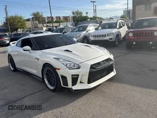 2020 Nissan GT-R Premium z VIN JN1AR5EF7LM100066, wystawiony jako Copart lot #58606645 z przebiegiem 35 824 mil mil oraz Szkody całkowita. Historia ofert i sprzedaży dostępna na DreamBid. Obrazek 1.