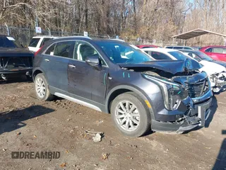 2022 Cadillac XT4 AWD Premium Luxury with VIN 1GYFZDR40NF139931, listed as a IAAI auction lot 41168482 with 28,748 mi miles and . Bid and sale history available at carsss.com. Image 1.