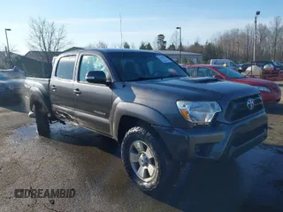 2014 Toyota Tacoma PreRunner with VIN 5TFJU4GN0EX057850, listed as a IAAI auction lot 41656053 with 170,269 mi miles. Bid and sale history available at carsss.com. Image 1.