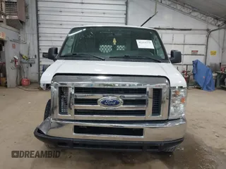 2014 Ford Econoline Cargo Commercial z VIN 1FTNE2EW8EDB01271, wystawiony jako IAAI lot #42211279 z przebiegiem 109 993 mil mil oraz . Historia ofert i sprzedaży dostępna na DreamBid. Obrazek 12.