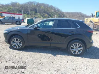2023 Mazda CX-30 S Carbon Edition with VIN 3MVDMBCM1PM509987, listed as a IAAI auction lot 42060833 with 14,140 mi miles and . Bid and sale history available at DreamBid. Image 14.