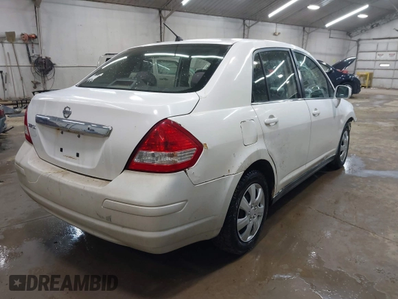 2009 Nissan Versa 1.8 S with VIN 3N1BC11E19L382848, listed as a IAAI auction lot 41929836 with 185,990 mi miles. Bid and sale history available at carsss.com. Image 4.