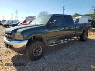 2000 Ford F-350 XL with VIN 1FTSW31F7YEE20820, listed as a Copart auction lot 77496284 with 312,193 mi miles and Salvage Title. Bid and sale history available at DreamBid. Image 1.
