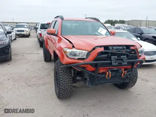 2016 Toyota Tacoma SR with VIN 5TFCZ5AN7GX026607, listed as a IAAI auction lot 41644761 with 163,618 mi miles. Bid and sale history available at carsss.com. Image 1.