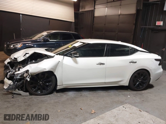 2016 Nissan Maxima SL with VIN 1N4AA6AP2GC439621, listed as a IAAI auction lot 41745052 with 23,484 mi miles and . Bid and sale history available at DreamBid. Image 14.