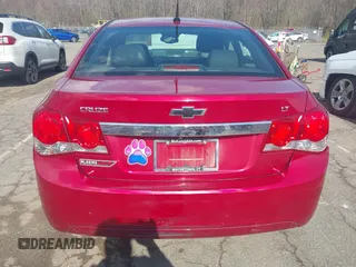 2014 Chevrolet Cruze 2LT z VIN 1G1PE5SB6E7450500, wystawiony jako IAAI lot #41977117 z przebiegiem 102 037 mil mil oraz . Historia ofert i sprzedaży dostępna na DreamBid. Obrazek 17.