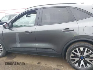 2020 Ford Escape SE Sport Hybrid with VIN 1FMCU0BZ0LUC52871, listed as a IAAI auction lot 42225741 with Not provided miles and . Bid and sale history available at DreamBid. Image 13.