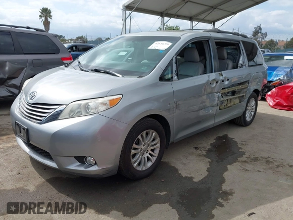 2015 Toyota Sienna XLE with VIN 5TDYK3DC1FS611521, listed as a IAAI auction lot 42136356 with 102,734 mi miles. Bid and sale history available at carsss.com. Image 18.