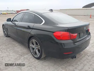 2016 BMW 4 Series 428i with VIN WBA4A9C51GG506512, listed as a IAAI auction lot 41940754 with 144,999 mi miles and . Bid and sale history available at DreamBid. Image 3.