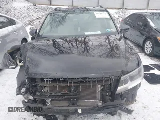 2019 Volkswagen Tiguan SE z VIN 3VV2B7AX5KM092909, wystawiony jako IAAI lot #41645271 z przebiegiem 59 460 mil mil oraz . Historia ofert i sprzedaży dostępna na DreamBid. Obrazek 12.