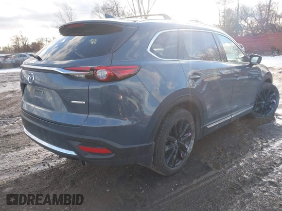 2022 Mazda CX-9 Grand Touring with VIN JM3TCBDYXN0618313, listed as a IAAI auction lot 41452750 with 34,356 mi miles and . Bid and sale history available at DreamBid. Image 4.